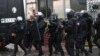 French police patrol in Longpont, north of Paris, France, Jan. 8, 2015. 