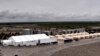 This undated photo provided by HHS’ Administration for Children and Families shows the shelter used to house unaccompanied foreign children in Tornillo, Texas. 