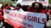 Protesters march in support of the girls kidnapped by members of Boko Haram in front of the Nigerian Embassy in Washington, D.C., May 6, 2014.