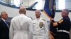 Secretary of Defense Jim Mattis, left, U.S. Navy Adm. Kurt Tidd, center left, U.S. Navy Adm. Craig Faller, center right, stand during a change of command ceremony at the U.S. Southern Command headquarters, Nov. 26, 2018, in Doral, Florida. 