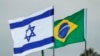 Foto yang diambil pada 31 Maret 2019 ini menunjukkan bendera Brazil dan Israel berkibar di Bandara Internasional Tel Aviv Ben Gurion di Tel Aviv menjelang kunjungan presiden Brazil kala itu ke Israel. (Foto: AFP/Jack Guez)
