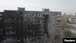 马里乌波尔一座被损坏的居民楼。(2022年4月19日)