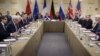 FILE - Representatives of world powers meet to pin down a nuclear deal with Iran, on March 30, 2015, in Lausanne, Switzerland. 