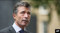 FILE - NATO Secretary General Anders Fogh Rasmussen.