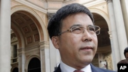 FILE - The then-chairman of the Bank of China, Liu Liange, arrives at a forum in Milan, Italy, on July 10, 2019. Liu has been expelled from the Chinese Communist Party after being accused of illegal activities and taking bribes.