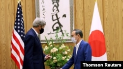 U.S. climate envoy Kerry visits Tokyo for talks with Suga