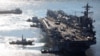 Tàu sân bay chạy bằng năng lượng hạt nhân USS Carl Vinson của Mỹ đi vào căn cứ hải quân của Hàn Quốc ở thành phố cảng Busan hôm 21/11/2023.