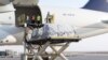 Staff members of King Salman Humanitarian Aid and Relief Center unload humanitarian aid at Beirut International airport to provide support following Tuesday's blast, Lebanon, August 8, 2020.