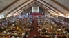 FILE - A mass in memory of Nelson Mandela takes place at the Regina Mundi church in Soweto, Johannesburg, South Africa, Dec. 2013.