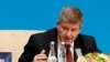 FILE PHOTO: International Labor Organization Director-General Guy Ryder speaks at a news conference in Beijing, Nov. 21, 2019.