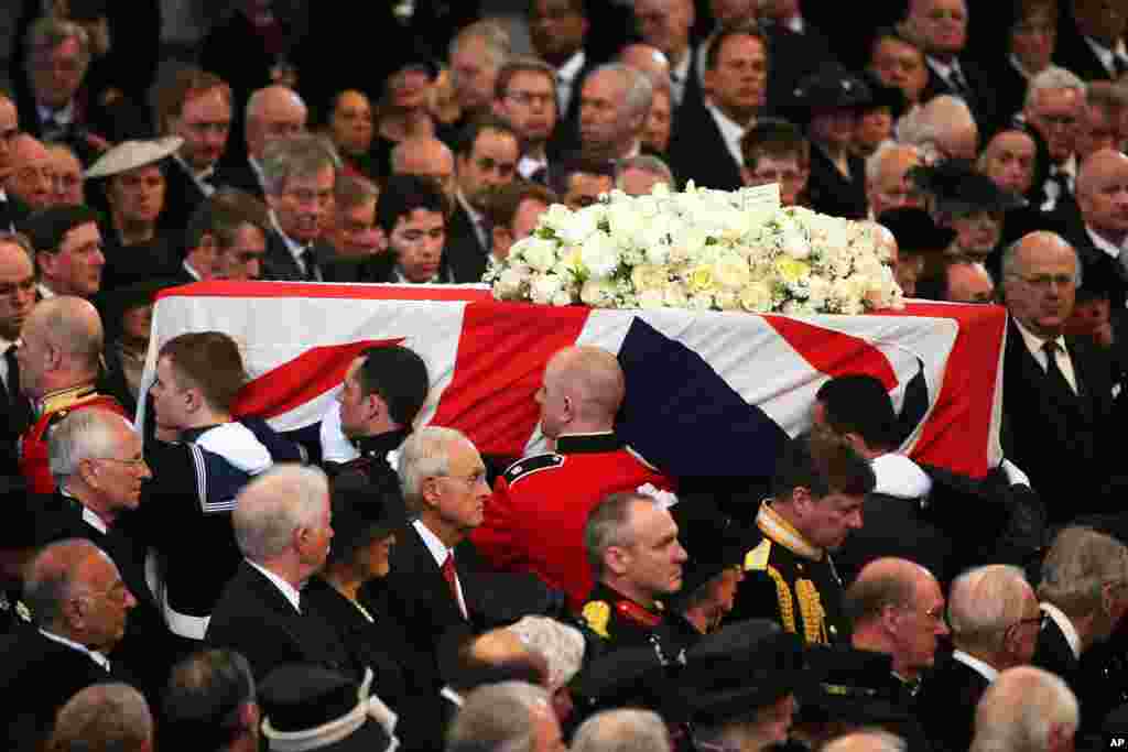 The coffin containing the body of former British Prime Minister Margaret Thatcher leaves the ceremonial funeral at St Paul's Cathedral in London. World leaders and dignitaries from 170 countries were in attendance.
