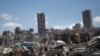 Damaged cars remain at the site of the Aug. 4 deadly blast in the port of Beirut that killed scores and wounded thousands, in Beirut, Lebanon, Aug. 17, 2020. 