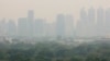FILE - A thick layer of smog covers Lumpini Park in central Bangkok, Thailand, Thursday, Jan. 31, 2019.