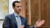 Syria's President Bashar al-Assad is interviewed Feb. 10, 2017, in Syria. Thousands of Afghans from Iran are involved in the Syrian conflict, many sent against their will, Human Rights Watch reports.
