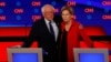 South Bend Mayor Pete Buttigieg, Sen. Bernie Sanders, I-Vt., and Sen. Elizabeth Warren, D-Mass., participate in the first of two Democratic presidential primary debates hosted by CNN Tuesday, July 30, 2019, in the Fox Theatre in Detroit.