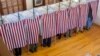 FILE - Voters cast their ballots at the Sutton town hall in the US presidential election, Nov. 8, 2016 in Sutton, New Hampshire. 