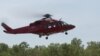 A helicopter takes off following U.S. military aircraft crash in Darwin, Australia, August 27, 2023.