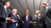 French Foreign Minister Laurent Fabius, second right, German Foreign Minister Frank-Walter Steinmeier, second left, British Foreign Secretary Philip Hammond, left, US Secretary of State John Kerry, center, and Austria's Foreign Minister Sebastian Kurz, ri