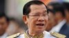 FILE - Cambodia's Prime Minister Hun Sen waits to attend Independence Day celebrations in Phnom Penh, Cambodia, Nov. 9, 2017.