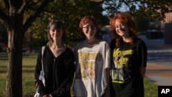 A group of friends and freshmen at the University of Missouri, Sylvia Debruzzi, left, Sarah Woods, center, and Emma Komoroski, right, who all identify as formerly religious, but currently unaffiliated, Sept. 8, 2023, in Columbia, Mo.