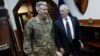 U.S. Defense Secretary James Mattis, right, and U.S. Army General John Nicholson, left, commander of U.S. Forces Afghanistan, arrive to meet with an Afghan defense delegation in Kabul Afghanistan, April 24, 2017. 
