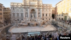 Rome unveils a pool to collect tourists' coins and wishes as the Trevi Fountain undergoes maintenance work, October 31, 2024.