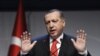 Turkey's Prime Minister Recep Tayyip Erdogan addresses a forum in Istanbul, October 13, 2012. 