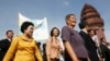 FILE - Sam Rainsy Party (SRP) members Chiv Kata, Thak Lany and Mu Sochua (L to R) walk during a protest in Phnom Penh November 16 , 2009.