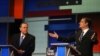 Sen. Ted Cruz, R-Texas, speaks as former Arkansas Gov. Mike Huckabee, left, listens during the first Republican presidential debate, Cleveland, IN, Aug. 6, 2015, in Cleveland. 
