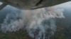 Fire consumes an area near Porto Velho, Brazil, Aug. 23, 2019. Brazilian state experts have reported a record of nearly 77,000 wildfires across the country so far this year, up 85% over the same period in 2018. 