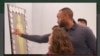 This image made from the National Academy of Sciences website on Oct. 2, 2019, shows part of a video of people discussing gene editing and designer babies.