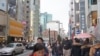 訪日中國遊客近年倍增的形勢令日本廣泛期待中國民間對改善中日關係起作用 (美國之音歌籃拍攝)