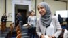 FILE - Representative Ilhan Omar addresses a small rally on immigration rights at the temporary installation of a replica of the Statue of Liberty at Union Station in Washington, May 16, 2019.
