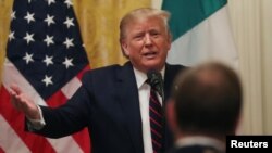 U.S. President Donald Trump speaks during a news conference in the East Room of the White House in Washington, Oct. 16, 2019.
