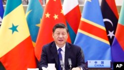 资料照片：中国领导人习近平2021年11月在中非合作论坛的一场会议开幕式上致辞。