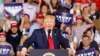 FILE - From left, Rashida Tlaib, Ilhan Omar, Rep. Alexandria Ocasio-Cortez and Ayanna Pressley respond to remarks by President Donald Trump.