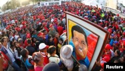 Magoya bayan tsohon shugaban kasar Venezuela suna layi suga gawarsa