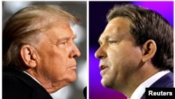 FILE PHOTO: Former U.S. President Donald Trump and Florida Governor Ron DeSantis speak at midterm election rallies