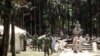 Soldiers from the Bangladesh Army erect tents at the torched Lal Ching Buddhist temple at Ramu, some 350 kilometres (216 miles) from the capital Dhaka, October 1, 2012.