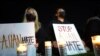 A group of Asian-American women light candles as they attend a peace vigil to mourn the victims of anti-Asian hate crimes at Almansor Park, Alhambra, California, U.S., March 21, 2021. 