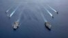 美国海军的尼米兹号和里根号航空母舰组成的双航母战斗群7月6日在南中国海航行。（美国海军提供）