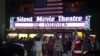 Fans line up at the Silent Movie Theatre for a midnight screening of "The Interview" in Los Angeles, California, Dec. 24, 2014.