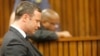Oscar Pistorius, who was found not guilty in the shooting death of his girlfriend, Reeva Steenkamp, cries in the dock in Pretoria, South Africa, Sept. 11, 2014.