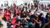 Syrian refugee children play at a makeshift school, supported by UNICEF and in cooperation with the Beyond Association, in Zahle in the Bekaa valley.