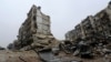A general view shows the damage in the government-held al-Shaar neighborhood of Aleppo, Syria, during a media tour, Dec. 13, 2016.