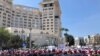 FILE - Security forces block a road as teachers protest in Amman, Jordan, Sept. 5, 2019. Thousands of Jordanian teachers held a protest demanding higher wages, with some scuffling with security forces.