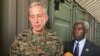 Gen. Thomas D. Waldhauser, left, commander of U.S. Africa Command, is joined by U.S. Ambassador to Senegal Tulinabo S. Mushingi, right, after a tour of Camp Cisse where the U.S. maintains a small site in Dakar, Senegal, July 30, 2018. 