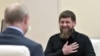 FILE - Head of the Chechen Republic Ramzan Kadyrov speaks during a meeting with Russia's President Vladimir Putin at a residence near Moscow, Aug. 31, 2019. (Sputnik/Alexei Nikolsky/Kremlin via Reuters) 