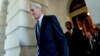 FILE - Former FBI Director Robert Mueller, the special counsel probing Russian interference in the 2016 election, departs Capitol Hill following a closed-door meeting in Washington, June 21, 2017. 