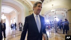Sen. John Kerry walks to the Senate floor on Capitol Hill in Washington, Tuesday, Dec. 4, 2012.